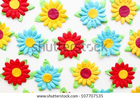 Close up colorful paper flowers