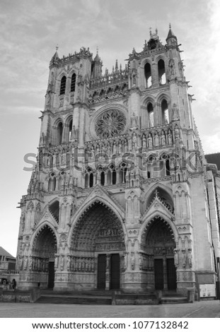 The facade of the Gothic cathedral in black and white. Bottom view.