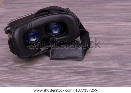  VR device on a wooden background