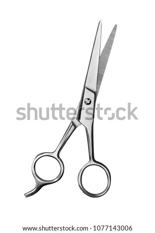 metal hair scissors isolated Royalty-Free Stock Photo #1077143006