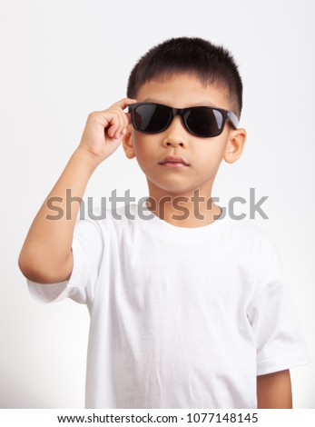 little boy with sunglasses on white background.