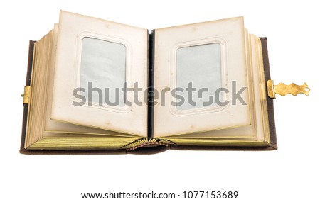 Vintage photo album with photo paper pages isolated on white background