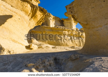 Beautiful nature view from desert on stone mountains. Outdoor scenic pictures landscape of mountains, sand and rocks.