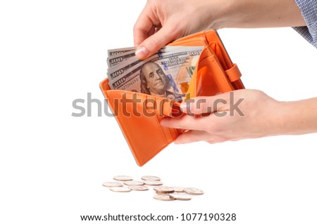 Money in wallet. A woman counting cash. 