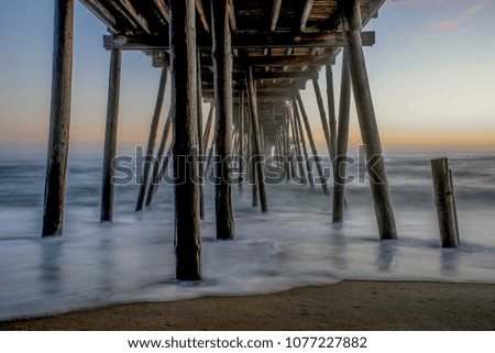 early morning at Avalon pier North Carolina Royalty-Free Stock Photo #1077227882