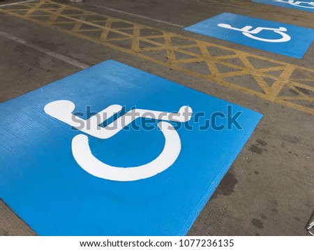 Car Disabled parking sign outdoor, white and blue color and copy space for text