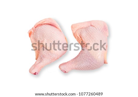 Raw chicken legs isolated on white background. Royalty-Free Stock Photo #1077260489