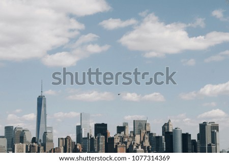 Panoramic skyline of Manhattan New York in a vintage look on a bright day.