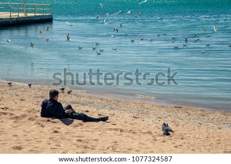 young man on the beach, 