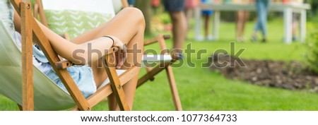 Summer relax on sunbed in the countryside
