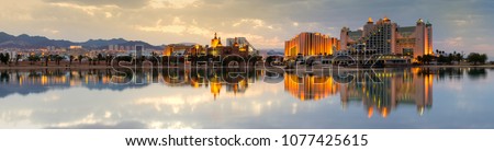 Night panoramic view on the central public beach of Eilat - famous resort and recreational city in Israel Royalty-Free Stock Photo #1077425615