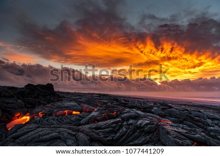 Lava sunrise on the southeast rift zone of Kilauea volcano Royalty-Free Stock Photo #1077441209