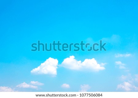 Sky blue or azure sky and clouds is bright daytime background. Everything lies above surface atmosphere outer space is sky. Cloud is aerosol comprising visible mass of liquid droplets frozen in air.