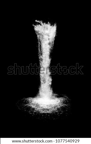 waterfall isolated on the black background Royalty-Free Stock Photo #1077540929