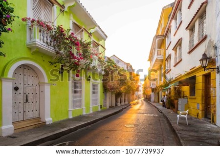 Sun ray during sunrise in the streets of Cartagena, Colombia Royalty-Free Stock Photo #1077739937