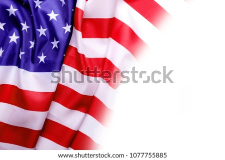 Patriotic composition w/ ruffled American flag on black background. United States of America stars & stripes symbol with copy spase for text. 4th of july Independence day concept. Background, close up