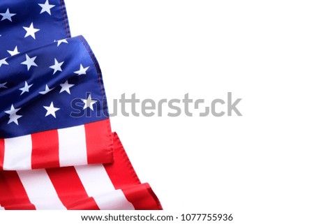 Patriotic composition w/ ruffled American flag on black background. United States of America stars & stripes symbol with copy spase for text. 4th of july Independence day concept. Background, close up