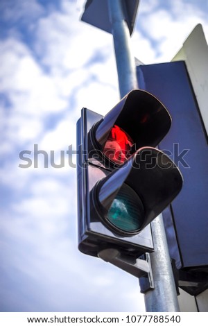 Traffic light against the sky