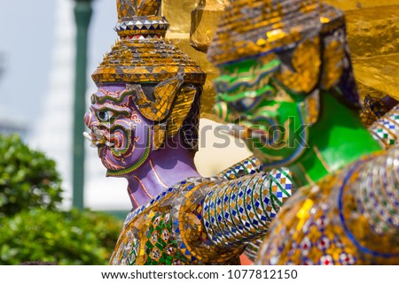 The demon statues in Ramayana the epic that is called in Thai as Ramakien They are made as the temple guardians then they are known as the Emerald Buddha  temple demon-guardians 