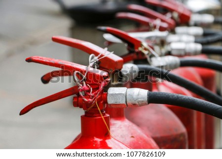  Overview of a powerful industrial fire extinguishing system,Old red tank of fire extinguisher,compressed gas carbon dioxide in side.