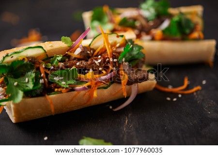 banh mi sanwdiches with beef. close up Royalty-Free Stock Photo #1077960035