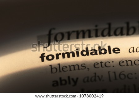 formidable word in a dictionary. formidable concept Royalty-Free Stock Photo #1078002419