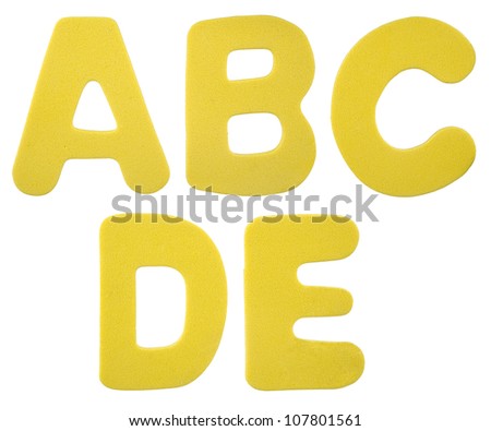 Alphabet made from foam plastic isolated on white background.