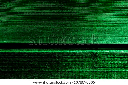 Dark green colored texture of a wooden wall