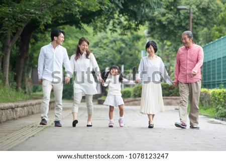 Japanese family walk in the park
