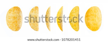 Vertical potato chips, isolated on white background Royalty-Free Stock Photo #1078201451