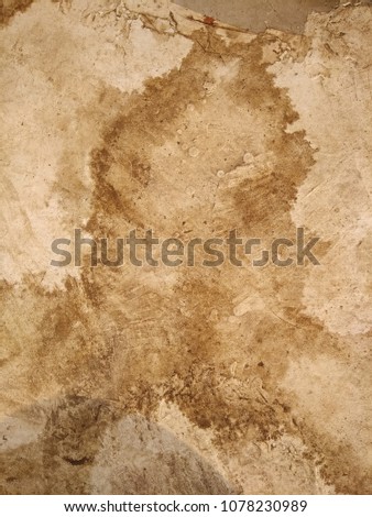 The Grunge of the Concrete surface. The Depiction of the Nebula ( the birthplace of Stars). Abstract background of Brown, Black and White color. 