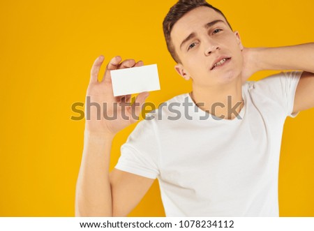   logo, free place, a man in a white T-shirt with a business card                            