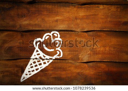 big wooden bricks background. horizontal banner free place. Ice cream picture. Hot summer time relax concept. Walking around the city, dream of licking a refreshing treat. Shop stall cheap street cafe
