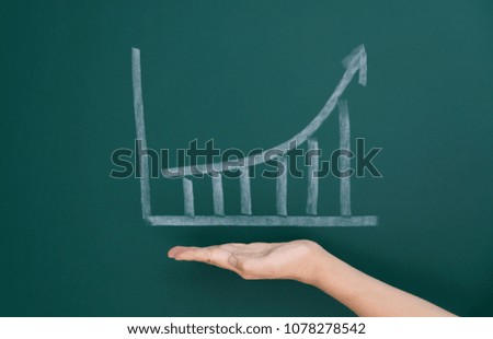 White chalk draw increment chart on blackboard