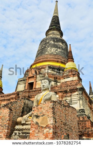 The buddha statue and pagoda at Yai chai mongkhon temple, Ayutthaya province, Thailand