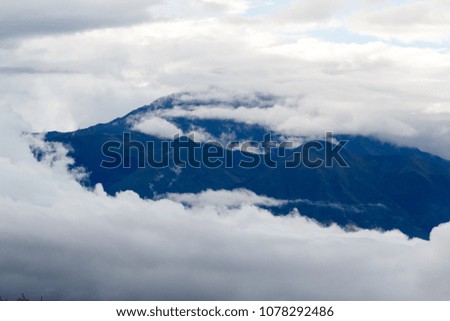 black mountain and clouds