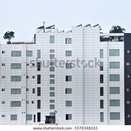 A stylish modern residential architectural building with windows unique stock photo