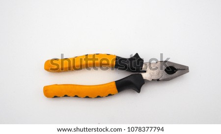 Pliers on white background top angle view, tool or equipment for repair ,maintenance for worker construction or at home .