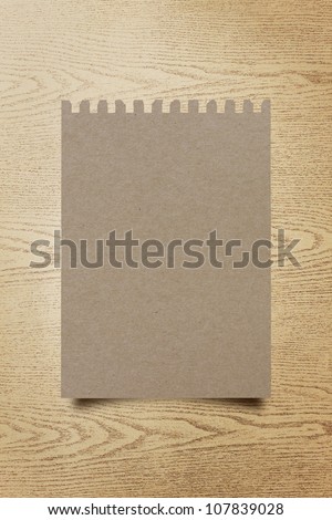old recycle paper page notebook. textured isolated on the wood backgrounds.