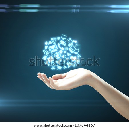 hand holding social media icons