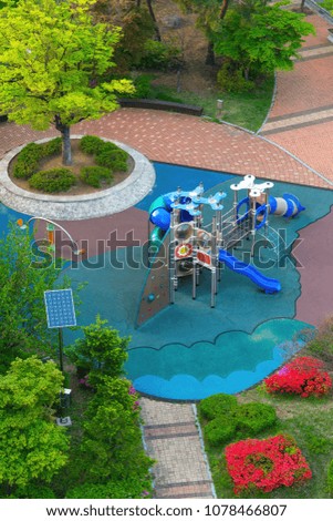 Aerial view of children's slides at park outdoor.