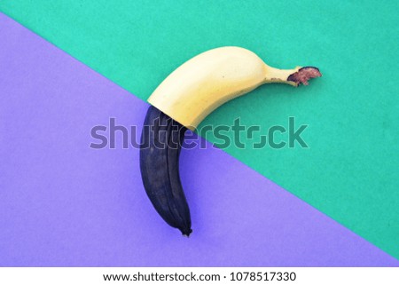 Half fresh and half brown bananas on two different backgrounds