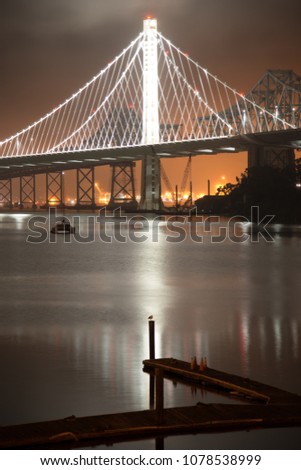 View of the Bay Bridge lit up at night, San Francisco, North Beach, California, USA