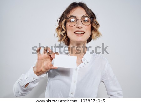 business card, badge, woman with glasses                          