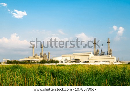 Modern and high technology electric power plant and smokestack and blue sky in evening with copy space
