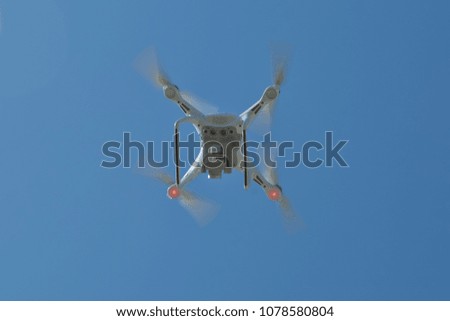 Drone quad copter with high resolution digital camera on the sky
