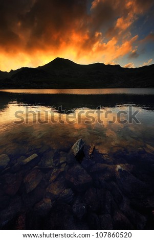 Sunset light over Bucura Lake, National Park Retezat, Romania
