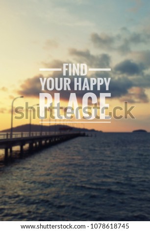 Inspirational quote - Find your happy place . Blurry sunset background.
