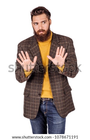businessman making stop sign with hand. emotions and people concept. image on a white studio background.