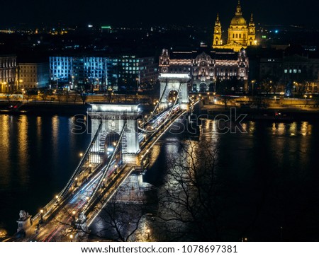 Panoramic view of Szechenyi Chain Bridge over Danube, Budapest, Hungary at night